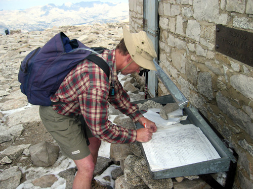 Jon Ball signs the Whitney summit register